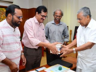 Books published by Malayalam University given to Hon. Chief Minister of Kerala .